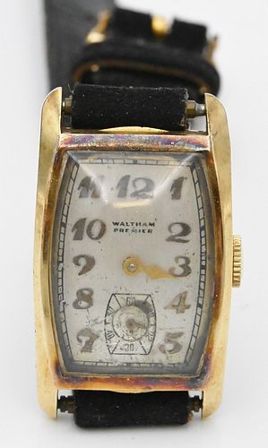 14 Karat Waltham Premier Vintage Rectangular Wristwatch, (hour hand missing), 21.5 x 28.6 millimeters.