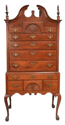 Chippendale Walnut Highboy, in two parts, upper section with bonnet top over three short drawers, over four drawers, having fan carved center drawer