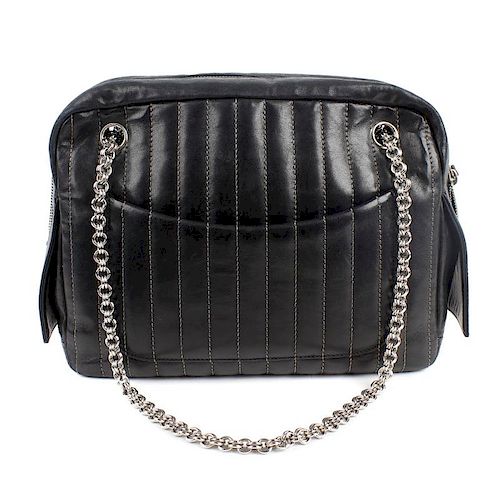 CHANEL - a pinstripe leather bag. In black leather, with grey stitched parallel lines, two outer poc