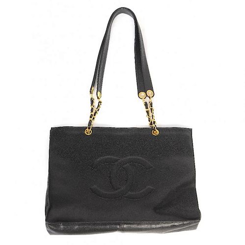 CHANEL - a Caviar Leather CC Shopper. Designed with an open top, pebbled black Caviar leather exteri