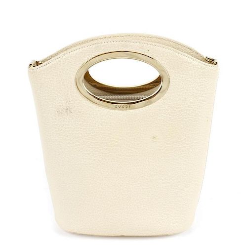 GUCCI - a small beige leather structured tote. Designed with an open top, engraved gold-tone hardwar