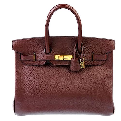 HERMES - a Togo 35cm Birkin Bag. Featuring a brown pebbled Togo leather exterior, dual rolled handle