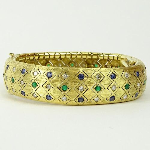 Lady's Vintage 18 Karat Yellow Gold Flexible Link Bangle Bracelet Manual Movement Watch set throughout with Round Cut Diamonds, Sapphires and Emeralds