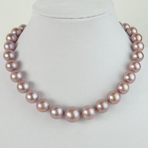 Single Strand Graduated Lavender Pearl Necklace with 14 Karat White Gold Clasp.