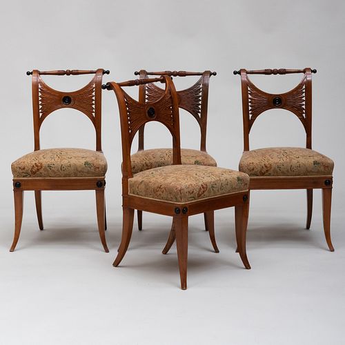 Set of Four Biedermeier Carved Walnut and Ebonized Side Chairs