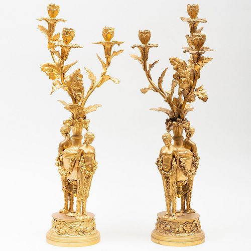Pair of Louis XVI Style Gilt-Bronze Three-Light Figural Candelabra