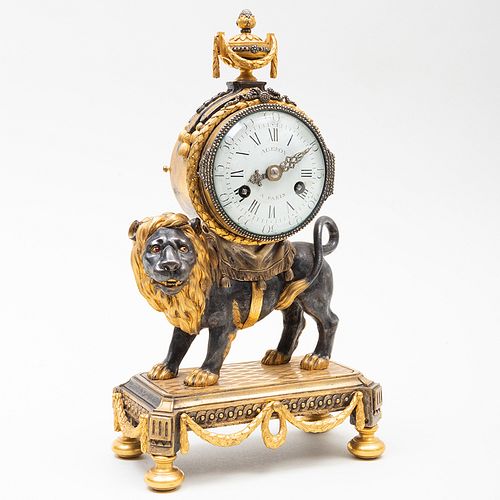 Rare and Unusual Louis XVI Ormolu, Blued Metal and Patinated-Bronze Lion-Form Mantel Clock, Dial Signed Ageron A Paris