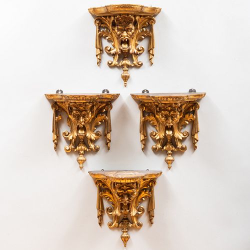 Set of Four Continental Baroque Style Carved Giltwood Brackets with Masks