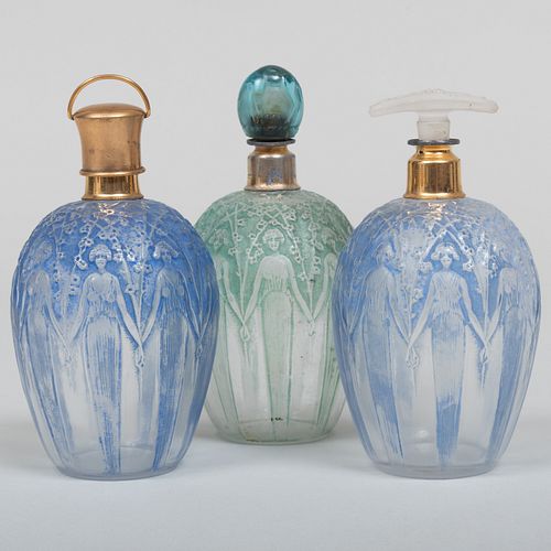 Three Lalique Patinated Glass Scent Bottles
