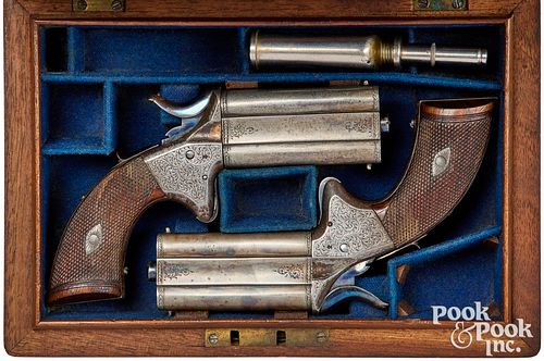 Cased pair Woodward's Patent double barrel pistols