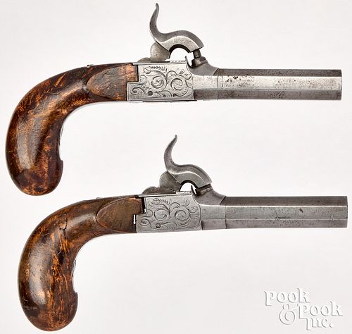 Pair of engraved box lock percussion pistols
