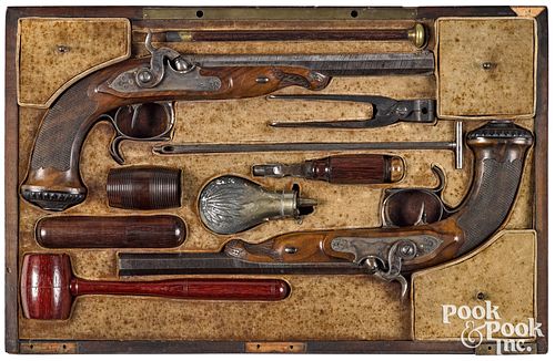 Cased pair of French percussion dueling pistols