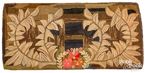 Floral hooked rug, late 19th c.