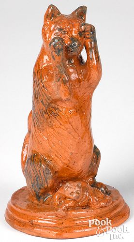 Redware figure of a rearing cat