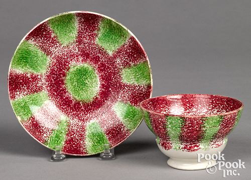 Red and green rainbow spatter cup and saucer.
