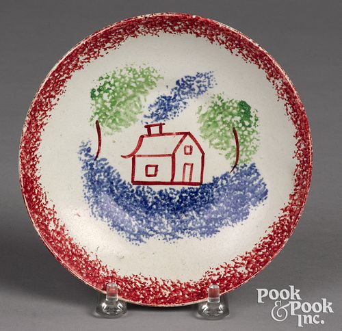 Red spatter saucer, with an unusual shed variant.