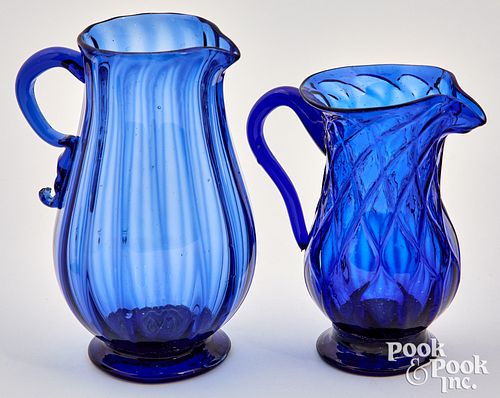 Two Stiegel cobalt glass cream pitchers, 19th c.,