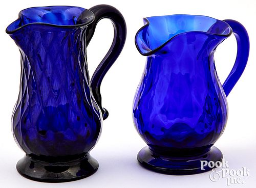 Two Stiegel type cobalt glass cream pitchers