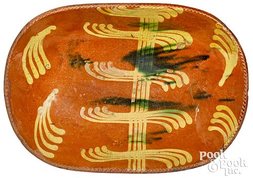 Pennsylvania redware oval loaf dish, mid 19th c.