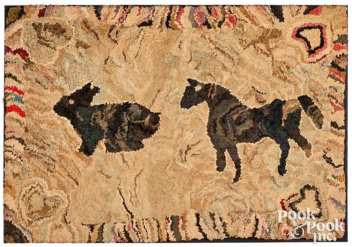 Early American rabbit and horse hooked rug