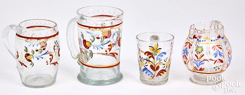 Four Stiegel type enameled handled mugs, 19th c.