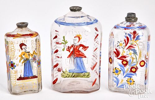 Three Stiegel type enameled bottles, 19th c.