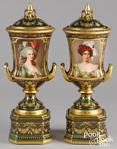 Pair of Vienna porcelain covered portrait urns