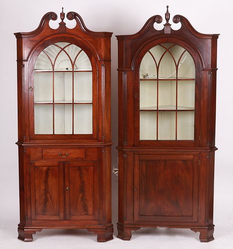 An Assembled Pair of Mahogany Corner Cupboards