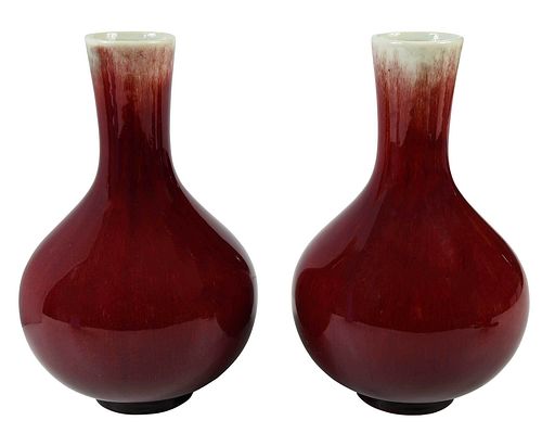 Pair of Chinese Sang de Boeuf Bottle Vases