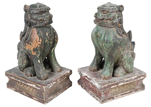 Pair of Chinese Polychrome Painted Wood Temple Foo Dogs