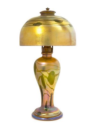 * A Tiffany Studios Gold Favrile Glass Lamp, Height overall 15 1/2 x diameter of shade 8 inches.