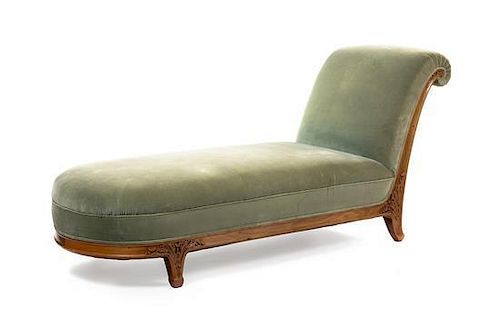 A Louis Majorelle Walnut Chaise Lounge, Length 80 inches.
