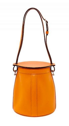 An Hermes Orange Clemence Feed Handbag, 6.75" x 7.25" x 5".