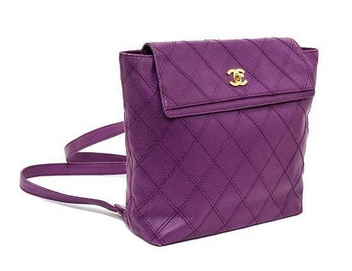 A Chanel Purple Quilted Caviar Leather Backpack, 12" x 10" x 3".
