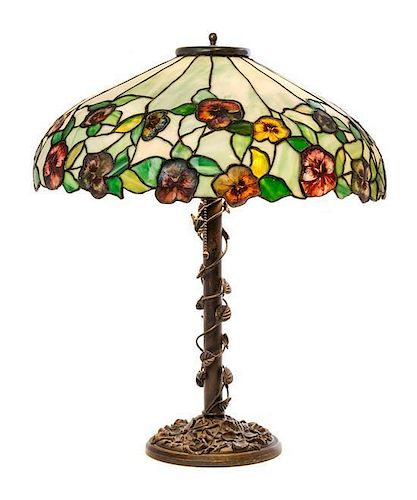 A John Morgan and Sons Leaded Glass Table Lamp, Height overall 24 x diameter of shade 20 1/8 inches.