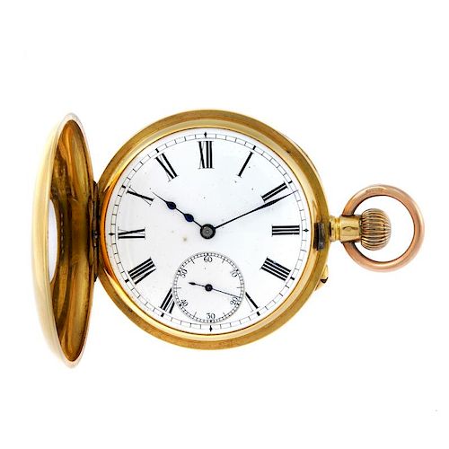 A half hunter pocket watch. Yellow metal case, stamped 18K with poincon. Unsigned keyless wind half
