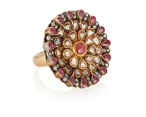 A ruby and diamond floret ring