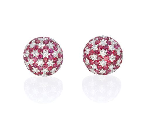 A pair of ruby and diamond dome earrings