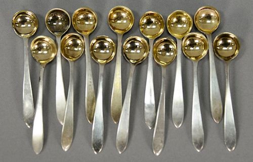 Tiffany & Co. Faneuil set of fourteen salt spoons with gold wash bowls. 2 t oz.