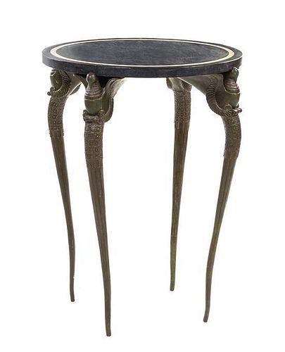 * A Patinated Bronze Center Table, after Armand-Albert Rateau, Height 33 3/4 x diameter of top 24 3/4 inches.