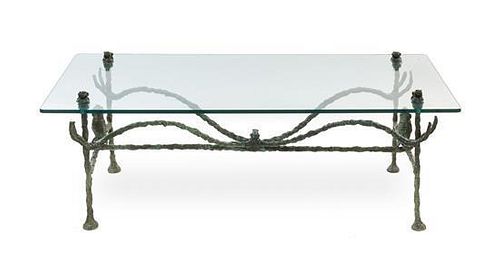 * A Patinated Bronze and Glass Low Table, Manner of Diego Giacometti, Height 18 x width 52 x depth 41 inches.