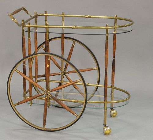 Mid-Century brass and wood drink cart with large spoked wheels. ht. 33 in.; lg. 35 in.