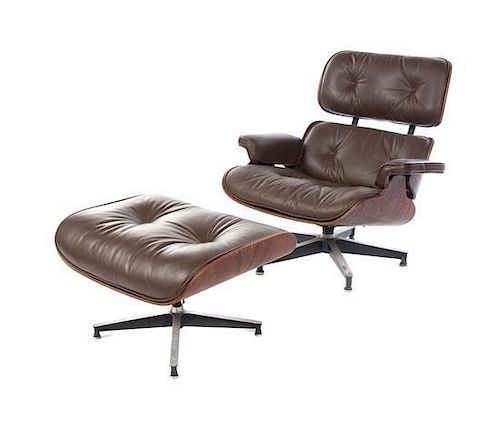 A Charles and Ray Eames Rosewood 670 Lounge Chair and 671 Ottoman, Height of chair 33 1/2 inches.