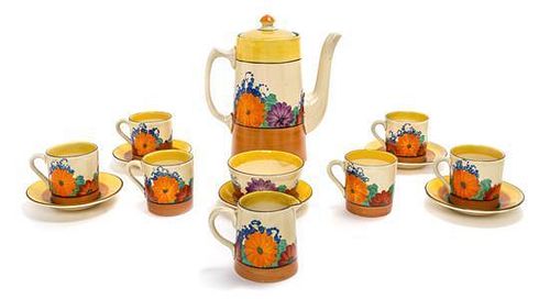 A Clarice Cliff Bizarre Ware Pottery Coffee Set, Height of first 7 inches.