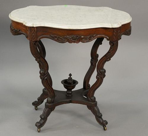 Rosewood Victorian turtle top table. ht. 30 in.; top: 21 1/2" x 31"