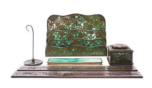 A Tiffany Studios Patinated Bronze Six-Piece Desk Set, Height of tallest 8 1/2 inches.