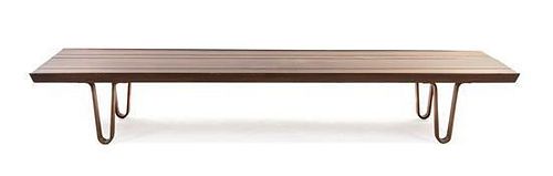 * An Edward Wormley Walnut Long John Low Table, for Dunbar, Height 11 1/2 x width 72 x depth 19 inches.