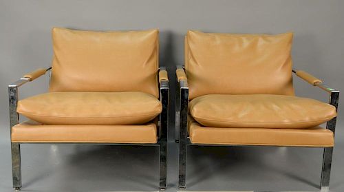 Pair of Milo Baughman chrome club chairs (chrome pitting).