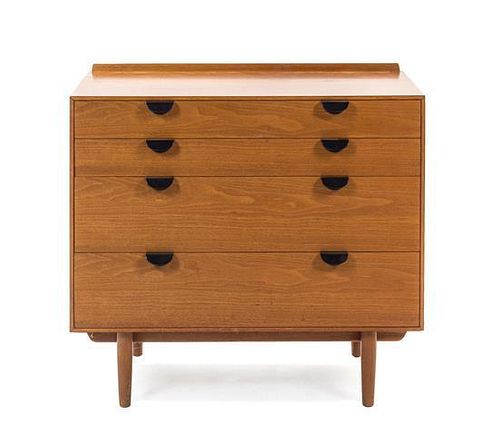 * A Finn Juhl Walnut Chest of Drawers, for Baker, Height 33 x width 36 x depth 18 inches.