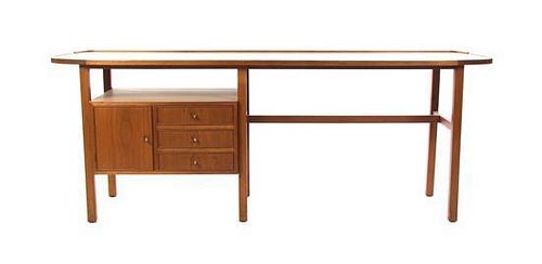 * A Walnut and Laminate Desk, Height 29 1/2 x width 78 x depth 22 inches.